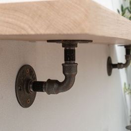 side view oak wall shelf with pipe brackets